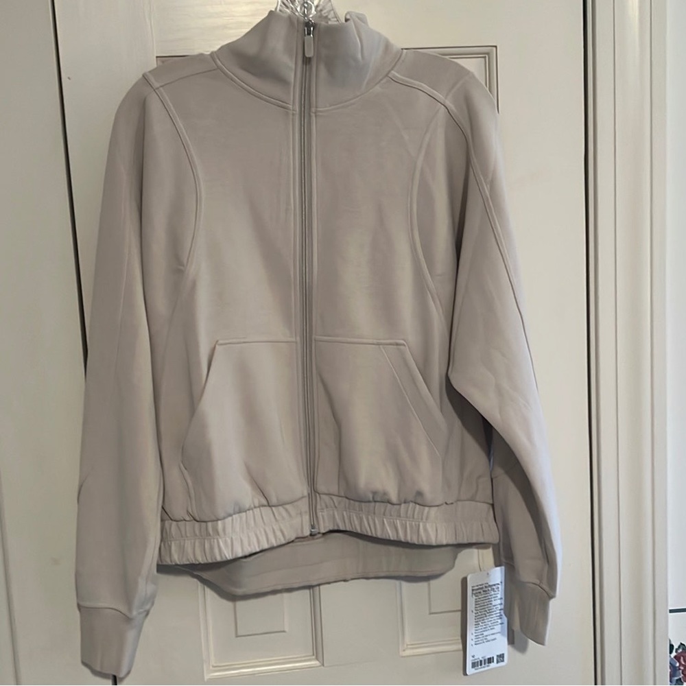 Lululemon brushed softstreme funnel neck zip up
In white opal NWT